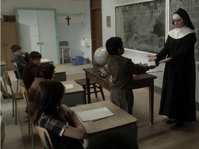 Rene Batson as Glen age seven/eight and Kristen Harris as Lebret Nun in re-enactments in the documentary We We Were Children, which was partially filmed at the Rufus Prince Building in Portage la Prairie. The film will be showing on the Aboriginal Peoples Television Network (APTN) on March 19 at 9:00 p.m. local time. (SUBMITTED PHOTO)
