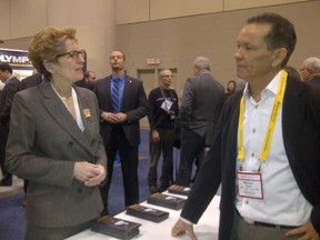 Shawn Batise, executive director of the Wabun Tribal Council, greets new Ontario Premier Kathleen Wynne recently at the Prospectors and Developers Association of Canada (PDAC) conference.
