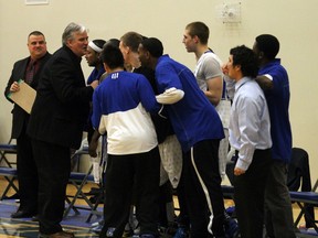 Huskies head coach Mike Connolly speaks with his team near the end of their game with the top-ranked team Briercrest Clippers at the ACAC championships March 2. TREVOR HOWLETT/TODAY STAFF