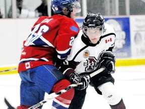 Michael Verboom, right, and the Chatham Maroons will try to get past the Strathroy Rockets when their GOJHL Western Conference semifinal starts Thursday at Memorial Arena. MARK MALONE mark.malone@sunmedia.ca
