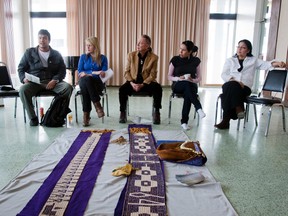 Bruce McComber (far left) talks Wednesday afternoon during a circle discussion of the Idle No More movement at the University of Sudbury. Also in attendance is Dr. Emily Faries (far right), a professor at the university and one of the first aboriginal women to earna PhD in Ontario.