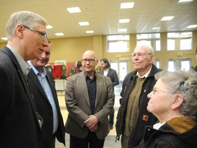 Verlyn Olson (left), Alberta minister of agriculture and rural development, Wayne Drysdale, Grande Prairie-Wapiti MLA, Everett McDonald Grande Prairie-Smoky MLA, meet with members of the farm family of the year Bennie Everton (second from right) and Audrey Everton (right) on March 8 at the 28th Peace Country Classic Agri-Show in Grande Prairie . The Everton family has been raising canola, barley and fescue in Hythe for nearly 100 years. (Patrick Callan/Peace Country Sun)
