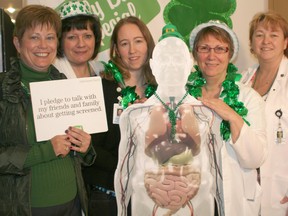 Several staff members from the Chatham-Kent Health Alliance have vowed to undergo routine colorectal screening. The pledge event was aimed at raising awareness of colorectal cancer, which is the second-leading cause of cancer deaths in Ontario. Posing with the 'invisible' man, are, from left: Nancy Snobelen, director of partnerships, system integration and rural health; Eleanor Groh, director of surgery; Leah Matteis, project manager for patient flow; Vivianne De Witte, coordinator of palliative care support; and Cyndi Harper Little, director of diagnostic imaging.