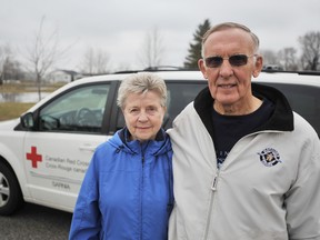 Red Cross Meals on Wheels volunteers Joan and Charlie Oxley are shown in this 2011 Observer file photo from the Mayors for Meals event. Last year the Canadian Red Cross delivered more than 25,000 meals to 285 clients in Sarnia. (The Observer)