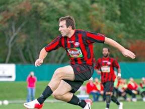 Brantford Galaxy's Ranko Galianin blasts a shot during a game at Lions Park last September. The Canadian Soccer League says it will have a season regardless of the recent actions by the Canadian Soccer Association. (File Photo)