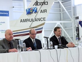 Health minister Fred Horne, Fort McMurray emergency doctor and senior medical director for AHS Emergency EMS Ian Phelps, and municipal affairs minister Doug Griffiths defend the province’s decision to relocate medevac services to Edmonton International Airport. VINCENT MCDERMOTT/TODAY STAFF