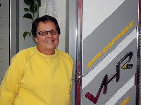 Elizabeth McSheffrey/Daily Herald-Tribune
Merle Hawryluk, owner of Suncapsule Tan ‘N’ Fitness Centre poses in front of an indoor tanning booth at her salon at 10822-100 Street on Wednesday. Hawryluk has owned the location for more than 17 years and says tanning in moderation provides a vital amount of Vitamin D.
