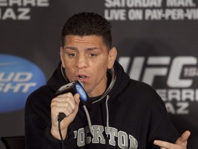 Nick Diaz does his best to get under the skin of champion Georges St. Pierre during a pre-fight press conference in Montreal yesterday ahead of UFC 158. (PHILIPPE-OLIVIER CONTANT/QMI AGENCY)