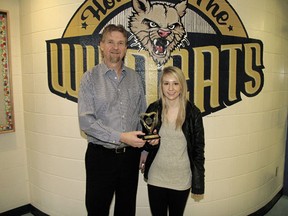 John Maland High School teacher Ron Zukowski presented Grade 12 student Karly French an award acknowledging French’s achievement of a 100 per cent grade on her Math 30-1 provincial exam at the school on Tuesday, Mar. 12.
“It’s very difficult to do,” said Zakowski of the achievement, which was the only 100 per cent exam a JMHS student scored in any subject in the first semester of this school year. “She’s a very dedicated student.”
French said she’s always had a talent for math, and is currently planning on attending the University of Alberta next year and studying in the sciences.