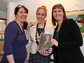 Adelaide Hunter Hoodless Homestead curator Catherine Stevenson, left, and volunteer coordinator Kate Belair thanked Sally Simpson for speaking at the museum on Friday, March 8, 2013 to celebrate International Women's Day. Simpson has been working a project exploring Canadian Aboriginal women's achievements through her studies at Wilfrid Laurier University in Brantford. Dozens of people showed up to participate in a tea party social in honour of great women. MICHAEL PEELING/The Paris Star/QMI Agency