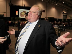 Mayor Rob Ford talks to the media at Canada Blooms and The Home Show Friday, March 15, 2013, at the Direct Energy Centre in downtown Toronto. (Stan Behal/TORONTO SUN)