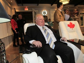 Mayor Rob Ford talks to the media at Canada Blooms and The Home Show Friday, March 15, 2013, at the Direct Energy Centre in Toronto. (Stan Behal/TORONTO SUN)