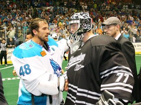 The Rochester Knighthawks beat the Edmonton Rush 9-6, taking the NLL title at Blue Cross Arena in Rochester, N.Y., on May 19, 2012. Rush netminder Aaron Bold shakes hands with Knighhawks goalie Matt Vinc.
Bill Wippert/QMI Agency