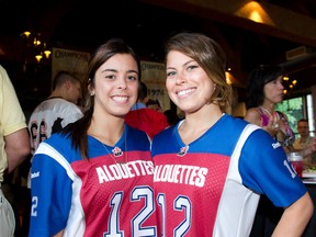 Roseline Filion and Meaghan Benfeito at the stock market event for the Montreal Alouettes on August 23, 2012. (BEN PELOSSE/QMI Agency)
