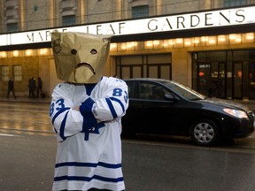 A man known only by the Twitter handle @60CarltonSt, but who could be the everyman of Leafs die-hards, poses outside Maple Leaf Gardens. Columnist Stephen Skyvington watched his beloved Leafs win four Stanley Cups by the time he was nine years old. Since them it's been a long wait for a fifth.