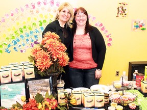 Home based businesses were on display on Saturday afternoon at the Timmins YMCA as local business owners took the time to display their wares and divulge just a little bit about what makes being a home business owner so special. Organizer Pamela Sarginson stood proudly in front of her display with her associate Amanda Froud, taking a brief break from the flurry of attention the display was getting. Photo taken on Saturday, March 16, 2013 in Timmins. TIMMINS DAILY PRESS