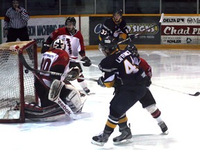 Kirkland Lake Gold Miners' Tanner Lafrance scores during Saturday's 4-1 playoff win against Blind River.