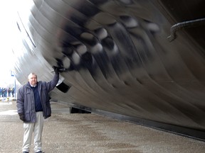 Ian Raven, executive director for the Elgin Military Museum hosted a tour of the former HMCS Ojibwa’s exterior Friday at Port Burwell, as part of a media event. One feature of particular note is damage created to the hull during military testing.