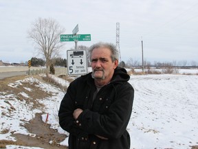 James Alderton of the Blenheim area is drawing attention to local roads protected by seasonal reduced load limits that are being torn up by trucks hauling gravel to wind turbine construction sites. Alderton wants to know who will pay the cost of the road repairs. VICKI GOUGH / THE CHATHAM DAILY NEWS / QMI AGENCY