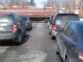 A driver was charged after his truck hit a train.