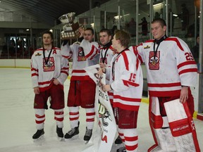 Kenora’s Midget AAA Thistles celebrate winning the Hockey Northwestern Ontario branch championships in Thunder Bay on March 18.
LLOYD MACK/Daily Miner and News