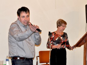 Local auctioneer Tim Rodgers, left, used some fast talking to help the La Prairie Lioness Club raise $15,095 for Central Plains Cancer Care Services Saturday night at the Royal Canadian Legion. Lioness president Heather Graham was very pleased with the success of the evening.
Clarise Klassen/Portage Daily Graphic/QMI Agency