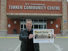 Art Pol, Donwest Construction vice president and St. Thomas & Elgin Home Builders' Association past president, stands outside the Timken Centre with a poster for this year's St. Thomas Home Show. This year's show runs from March 22 through March 24.