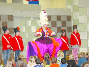 Soldiers – played by St. Dominic’s School students (from left) Samara Stewart, Saraiah Collbeck, Sophia Arguedas and Amanda Tutossi – flank the Queen during an Alberta Opera performance of Sleeping Beauty on Mar. 12 at the school. Students participated in several scenes. Next year’s show will be Aladdin and His Magic Lamp. For more pictures of the performance, please see Page 29.