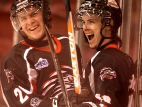 BIRDS IN FLIGHT— Soo Thunderbirds have opened up a two-games-to-none lead over Abitibi Eskimos in their first-round, best-of-seven, Northern Ontario Jr. Hockey League playoff series. The Birds used home ice to upend the Eskimos by 9-2 and 7-5 scores last weekend. Thunderbird players Dallas McLaughlin and Derek Battagin celebrate a goal.