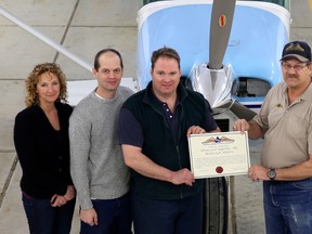 On Saturday, March 2, Al Blakely (r), from COPA, presented the executive of Whitecourt COPA Flight, from left: Sonja Vangilst, secretary, Jonas Boll, vice-president, and John Burrows, president, with their official COPA for Kids Charter Flight Number 185.
Submitted