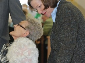Premier Redford chats with residents at the Vermilion Valley Lodge nursing home Friday morning.