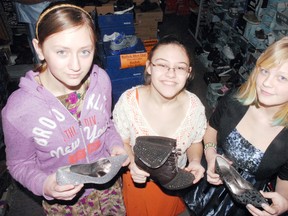 DANIEL R. PEARCE  Simcoe Reformer
Margaret Redecop (left), 14, Lisa Klassen, 13, and Kary Wall, 13, all of Houghton Public School looked at footwear.