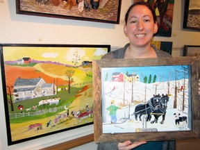 MONTE SONNENBERG Simcoe Reformer
The latest exhibit at the Eva Brook Donly Museum in Simcoe features the folk art offerings of Barbara Clark-Fleming, of Muir, and Michael A. Hunter, of Woodstock. Curator Helen Bartens, above, unveiled the exhibit March 1. It runs till the end of the month.