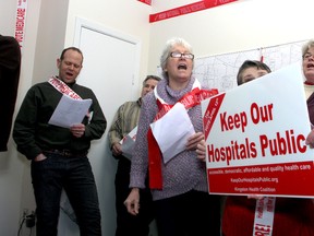 A choir sings "If We Had a Hundred Million" at the opening of the Keep Our Hospitals Public campaign office on Monday at the LaSalle Mews. (Ian MacAlpine The Whig-Standard)