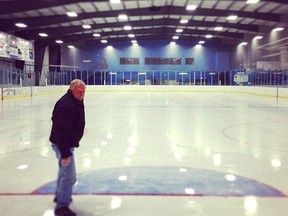 Dick Granley checks the ice at the Mayerthorpe Exhibition Centre.