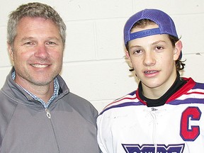 Belleville native John Ricketts and his son, Jack, of the Oakville Blades, at last weekend's OMHA bantam minor AAA championships at QSC Rink B. (Paul Svoboda/The Intelligencer)