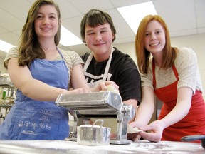 DANIEL R. PEARCE  Simcoe Reformer
Waterford District High School Grade 10 hospitality students Olivia Graham (left), 15, Thomas Pelko, 16, and Hannah Haviland, 16, came up with their own recipes for Ravioli as an end of term project. Teacher Teresa Kelly has been honoured for teaching kids to use locally produced ingredients.