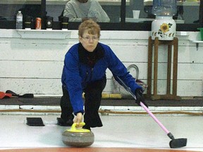 Skip Debbie Olsen takes her shot Friday, March 15. They were competing in the first game of a Mixed Bonspiel held at the Mayerthorpe Curling Rink. The action continued through to Sunday, March 17.