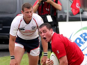 QMI file photo

Aaron Carpenter of Team Canada celebrates the game-winning try in front of Team U.S.A.'s  Will Holder during an international rugby match in KIngston last June. The Canadian senior men's side has a busy season ahead with several big international matches.