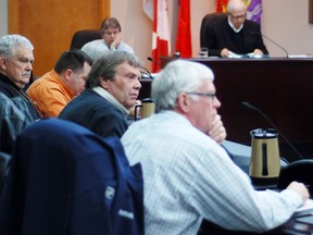 Former Coun. Leslie O'Shaughnessy, centre, at the council table.