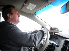 Maurice Quenville, video tapes drivers and potholes.
GINO DONATO/THE SUDBURY STAR