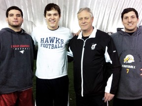 Chatham's Clark Green, second from left, trained last week in Montreal with, from left, Calgary Stampeders kicker Rene Paredes, Concordia University head coach Gerry McGrath and Hamilton Tiger-Cats kicker Luca Congi. (Contributed Photo)