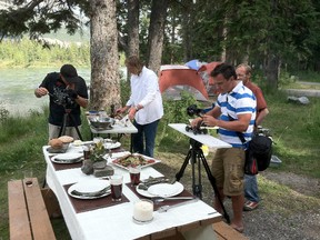 Former Banffite Les McDonald, right, sets up cameras to film the pilot of Rogues on the Road in the Bow Valley, an adventure travel culinary show he hopes to take to the Banff TV festival this summer. Courtesy of Tracker Productions