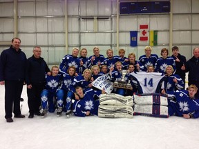 The members of the North East Midget AA hockey club celebrate their victory over Lloydminster in the Centre Four Hockey League final on Sunday night in Lloydminster. North East won Game 1 by a score of 2-1 in Melfort on Saturday night and Game 2 by a score of 5-3 in Lloydminster on Sunday night. They will now face Notre Dame for the provincial Midget AA championship next Tuesday