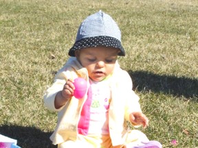 Eight-month old Shea Roberts has some fun with easter eggs in April 2012. (File photo)