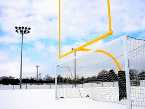 A light standard with glare shields installed at the Queen's West Campus field. (Ian MacAlpine The Whig-Standard)