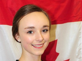 Mariah McCaw, 15, was thrilled to carry Canada's flag for gold medallist Patrick Chan at the World Figure Skating Championships. R. MARK BUTTERWICK Times-Journal