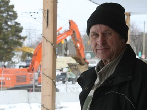 Case L'ami, owner of L'ami's Garden Centre on Lakeshore Drive, stands in front of his business of which access has been limited by detours and road closures related to the nearby replacement of the bridge over the LaVase River.