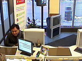 Kingston Police are asking for the public's help in identifying a man they allege deposited fraudulent cheques into a person's bank account and then withdrew the money.