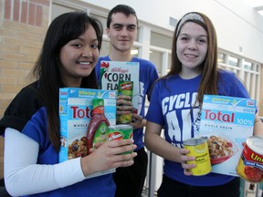 Members of the St. Christopher Secondary Cyclone Aid committee held a press conference Wednesday to spread the word about the 12th annual event being held this Saturday, March 23 in Sarnia-Lambton. Pictured are Eunice Tulang, Tyler Rotteau and Alisha Renaud. (TARA JEFFREY, The Observer)